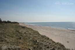 Zeme jūras krastā - MM.LV